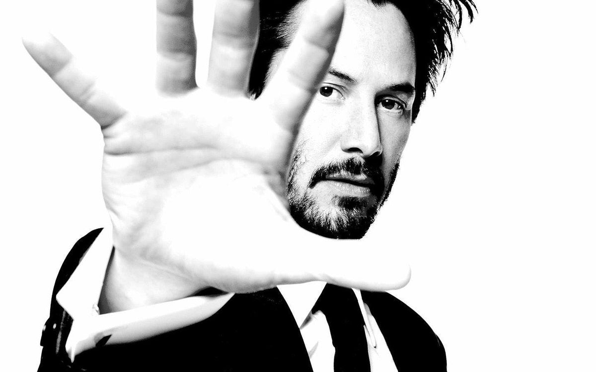 XXL Leinwandbilder KEANU REEVES ANZUG HAND